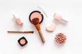Makeup background with rounge, powder and tools on white table top view Royalty Free Stock Photo
