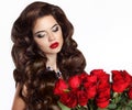 Makeup. Beautiful young woman with bouquet of red roses isolated Royalty Free Stock Photo