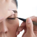 Makeup beauty with brush eye liner Royalty Free Stock Photo