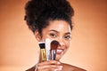 Makeup, black woman and brush for wellness, product and salon cosmetics. Foundation, self care and luxury with smile