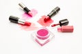 Makeup blush and lipsticks on white background Royalty Free Stock Photo