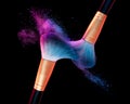 Makeup brush with blue powder explosion on black Royalty Free Stock Photo