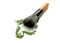 Makeup brush with color make up powder isolated on white. Royalty Free Stock Photo