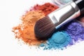 Makeup brush and colorful cosmetic powder on white background. Ai generative Royalty Free Stock Photo