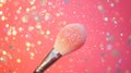 Sparkling Makeup Brush on Pink Background with Bokeh Royalty Free Stock Photo