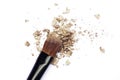 Makeup brush with gold eyeshadows