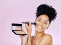 Makeup brush, palette and studio portrait of happy woman with tools, beauty product or cosmetics powder choice. Mirror Royalty Free Stock Photo