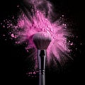 a makeup brush with pink face powder explosion on black background