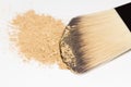 Makeup brush with powder foundation isolated on white background Royalty Free Stock Photo