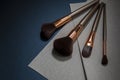 Makeup brush set with minimalist geometric shapes and copy space