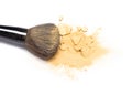 Makeup brush with shimmer powder golden color Royalty Free Stock Photo