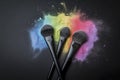 makeup brushes with rainbow colored powder burst Royalty Free Stock Photo