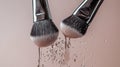 Makeup Brushes With Falling Powder and Water Droplets Royalty Free Stock Photo