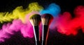 Makeup brushes exploding with vibrant colored powders Royalty Free Stock Photo
