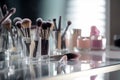 Makeup brushes in a glass. Clean professional makeup brushes set for make-up artist, cosmetics, make up theme. AI generated