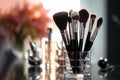 Makeup brushes in a glass. Clean professional makeup brushes set for make-up artist, cosmetics, make up theme. AI generated