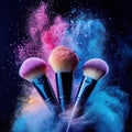 Makeup brushes releasing vibrant powder cloud, bursting with pigmented particles against dark backdrop Royalty Free Stock Photo