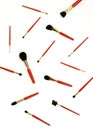 Makeup brushes set in red color on white background. Professional makeup tools Royalty Free Stock Photo