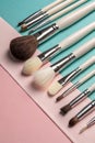 Makeup brushes with solid colors backgrounds Royalty Free Stock Photo