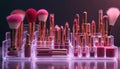 Makeup collection, organized in clear acrylic organizer, features lipsticks, brushes, various cosmetics. Displayed on reflective Royalty Free Stock Photo