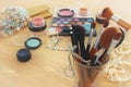 makeup cosmetics beauty tools and brushes on wooden background Royalty Free Stock Photo