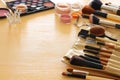 makeup cosmetics beauty tools and brushes on wooden background Royalty Free Stock Photo