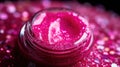 Makeup cosmetics, glitter glossy eye shadow or face blush, glitter in jar, pink glitter background, barbicor style