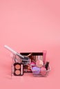 Makeup cosmetics such as eyeshadows, lipstick, mascara and makeup accessories. Makeup cosmetics sale concept Royalty Free Stock Photo