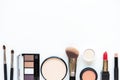 Makeup cosmetics tools background and beauty cosmetics, products and facial cosmetics package lipstick, eye shadow on the white ba Royalty Free Stock Photo