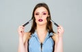 Makeup dark lips. Attractive woman applying makeup brush. Professional makeup supplies. Makeup artist concept. Girl Royalty Free Stock Photo