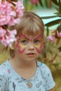 Makeup on the face of the child. Butterfly for the holiday