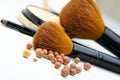 Makeup foundation, powder, bronzer and brushes Royalty Free Stock Photo