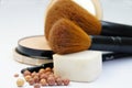 Makeup foundation, powder, bronzer and brushes Royalty Free Stock Photo