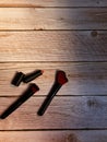 Makeup and lipstick brushes on wood Royalty Free Stock Photo