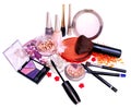 Makeup products and jewelry on white background Royalty Free Stock Photo