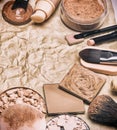 Makeup products to even out skin tone on aged paper frame