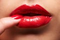 Makeup, red lipstick and closeup of woman lips with trendy, beauty and manicure treatment. Mouth, cosmetics and zoom of Royalty Free Stock Photo