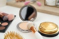 Makeup room. Different beauty products on white dressing table, closeup Royalty Free Stock Photo