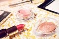 Makeup set of powder, natural makeup eyeshadows, mascara, red lipstick and lip pencil Royalty Free Stock Photo