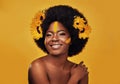 Makeup, sunflower and happy with portrait of black woman in studio for beauty, creative or spring. Natural, cosmetics Royalty Free Stock Photo