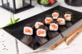 Maki rolls with salmon and cheese. Sushi menu.