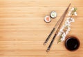 Maki sushi, chopsticks and soy sauce Royalty Free Stock Photo