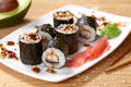 Maki sushi roll with eel, wasabi, ginger and nori Royalty Free Stock Photo