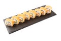 Maki Sushi - Roll made of Smoked Eel, Cream Cheese and Deep Fried Vegetables inside. Fresh Salmon outside. Hot fried Sushi Royalty Free Stock Photo