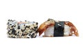 Maki sushi roll with sesame border and Anago sushi Royalty Free Stock Photo