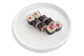 Maki sushi roll with tuna and wasabi. On a white ceramic plate. White background. Isolated Royalty Free Stock Photo