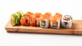 Maki Sushi Rolls set on wooden bamboo board.