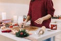 Making angel cookies from gingerbread rollout dough