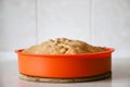 Making apple pie at home. Homemade pastry in silicone cake pan Royalty Free Stock Photo