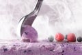 Making a berry ice cream with scoop front view Royalty Free Stock Photo
